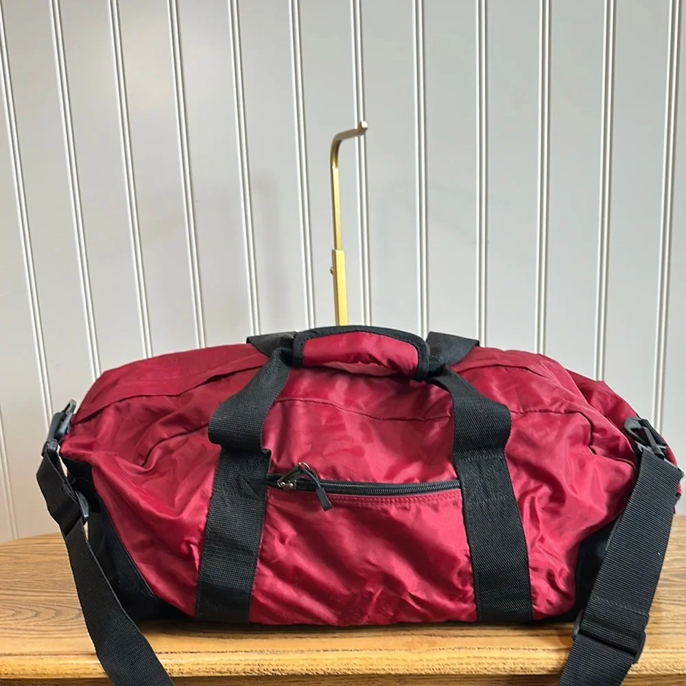 Classic Red Nylon Duffel Bag with Black Straps